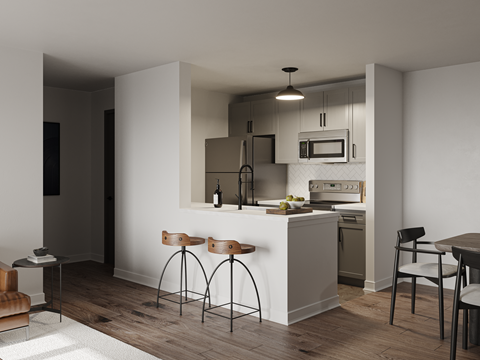 a kitchen and dining area in a 555 waverly unit